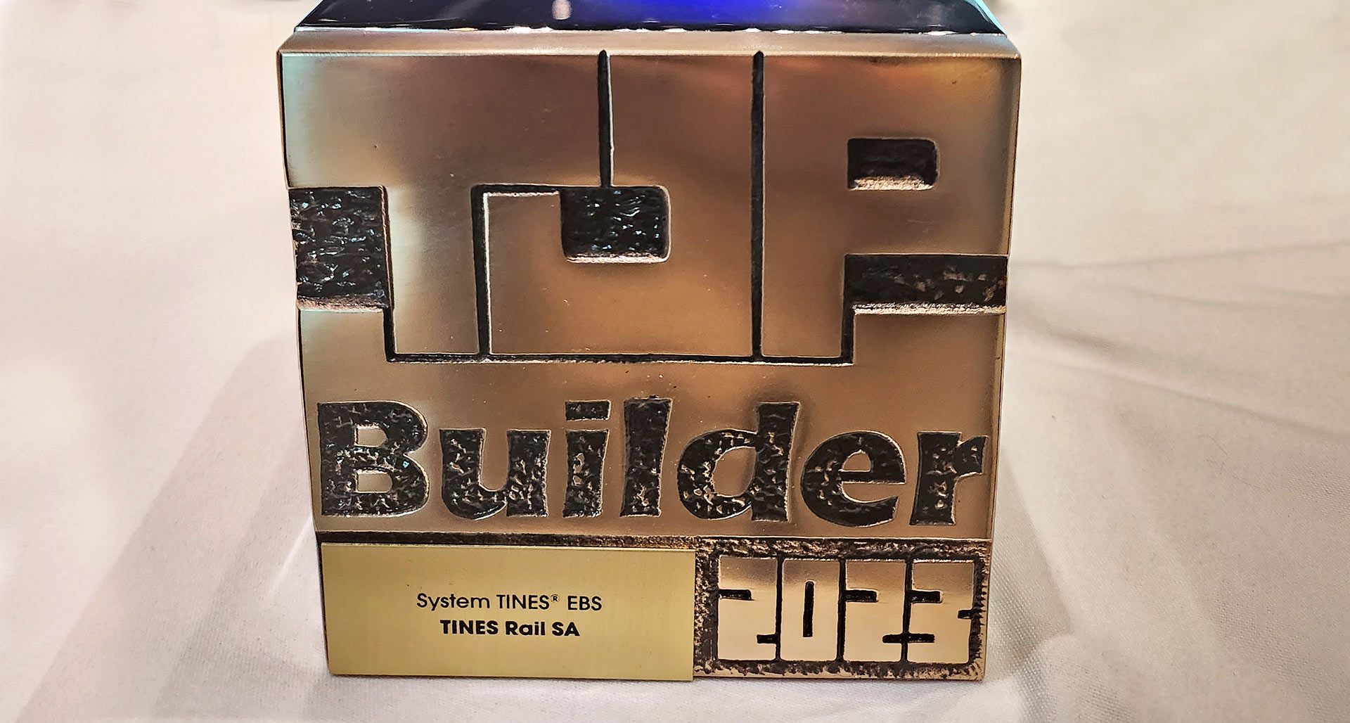 Top Builder - TINES Rail